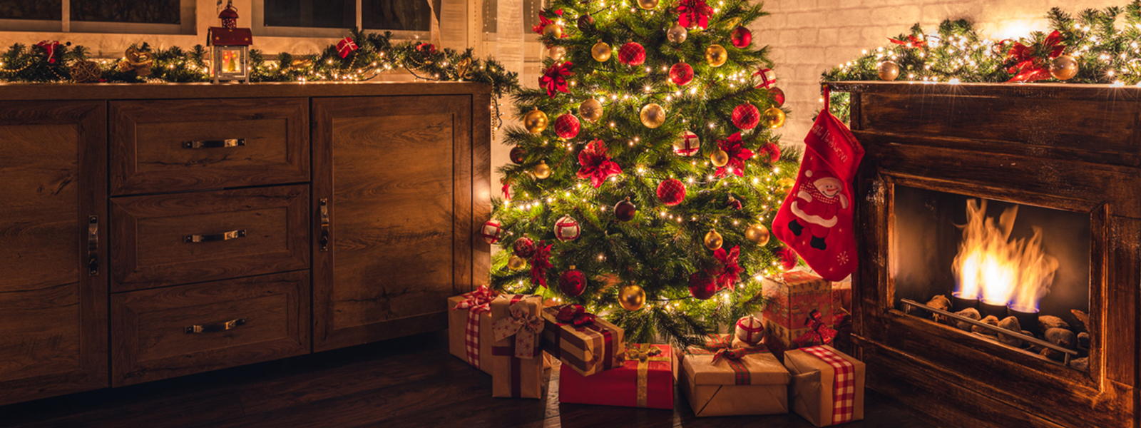 A Christmas tree stands in the room.