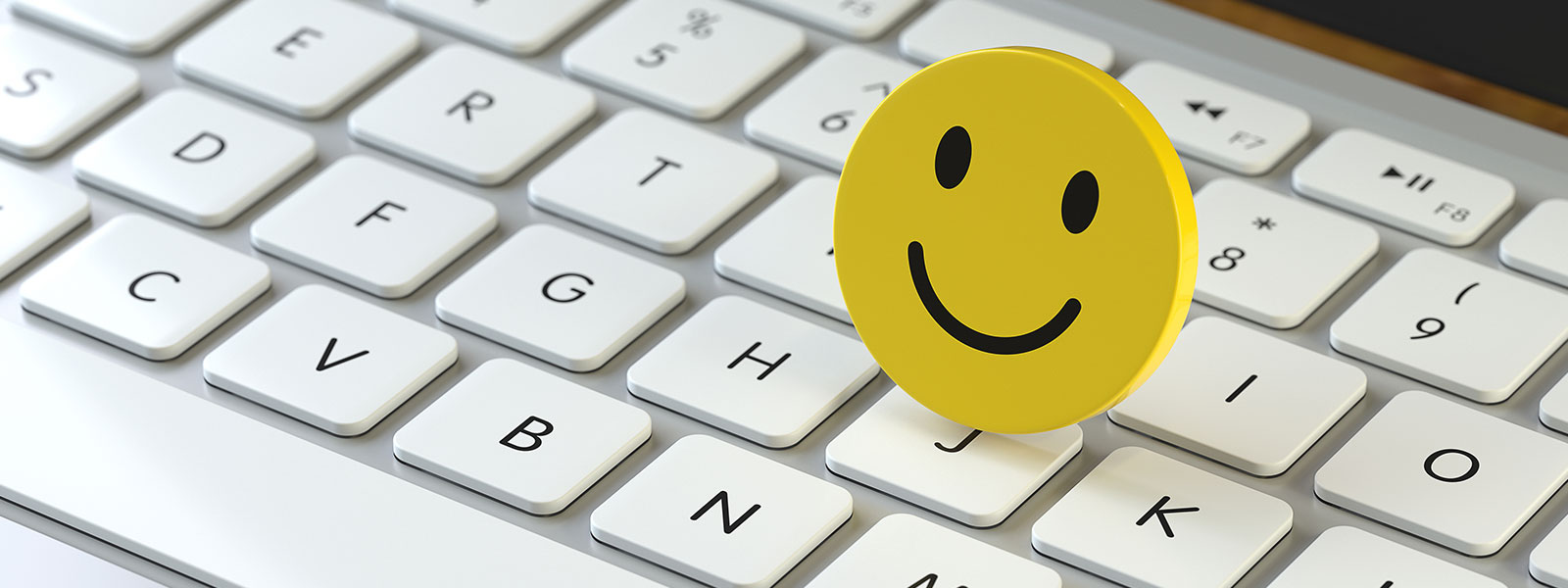 A smiley face on a keyboard