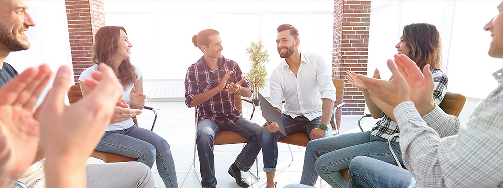 Group of people talking in happy mood